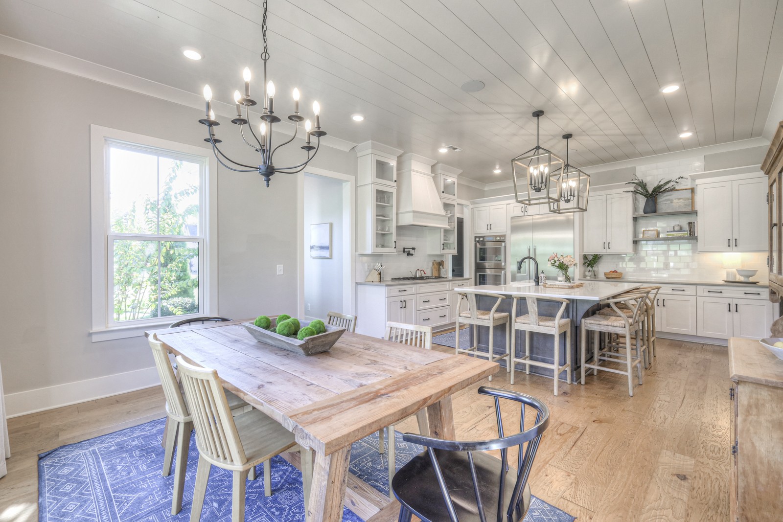 6929 Cross Keys Road College Grove, TN 37046 - Photo 14 of 72 a view of a dining room with furniture wooden floor and chandelier