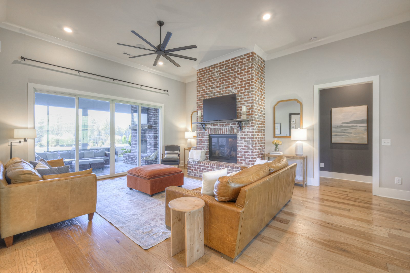 6929 Cross Keys Road College Grove, TN 37046 - Photo 16 of 72 a living room with fireplace furniture and a large window
