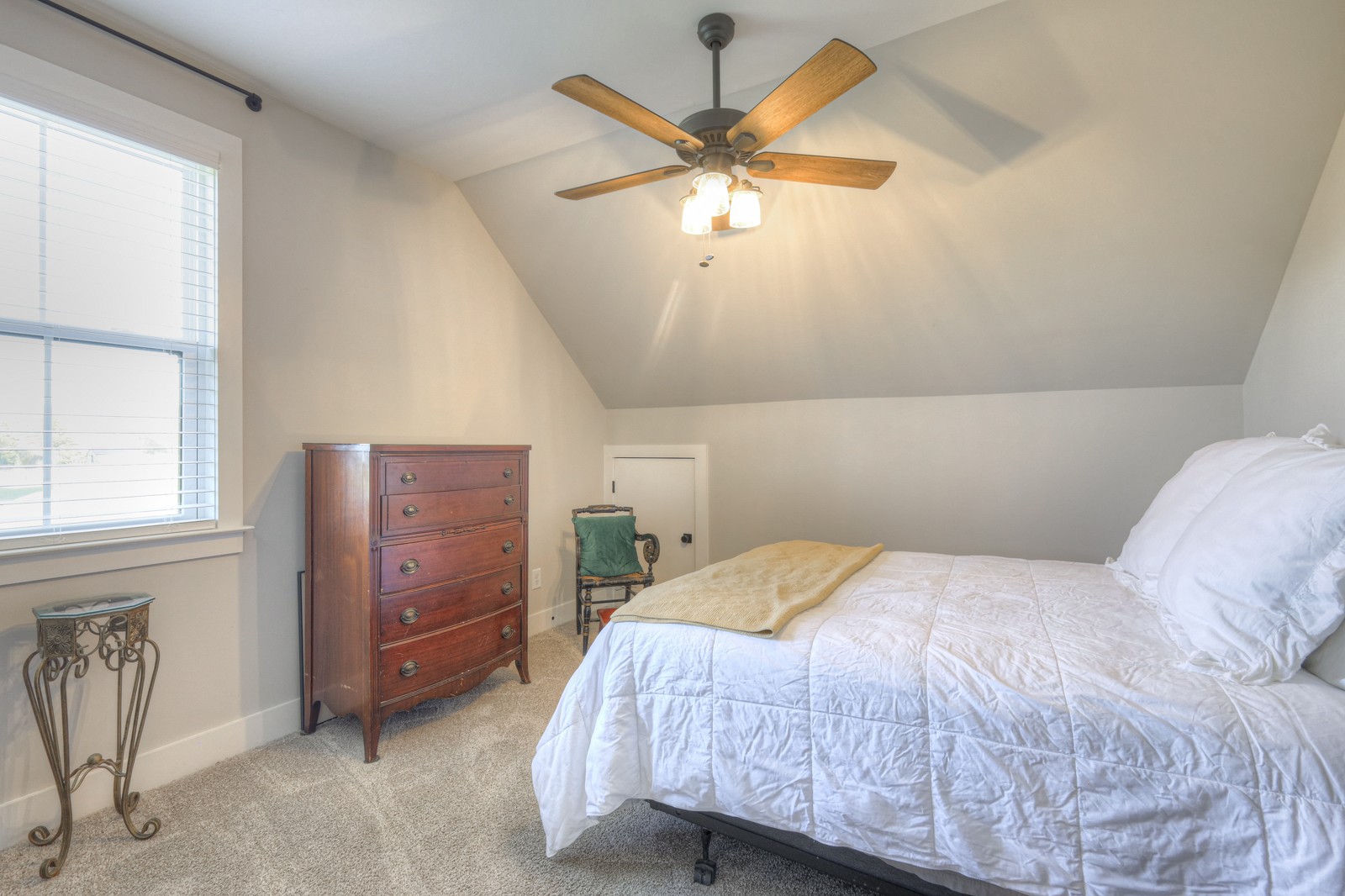 6929 Cross Keys Road College Grove, TN 37046 - Photo 62 of 72 a bedroom with a bed and a chandelier