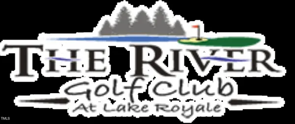 a front view of a house with garden and patio