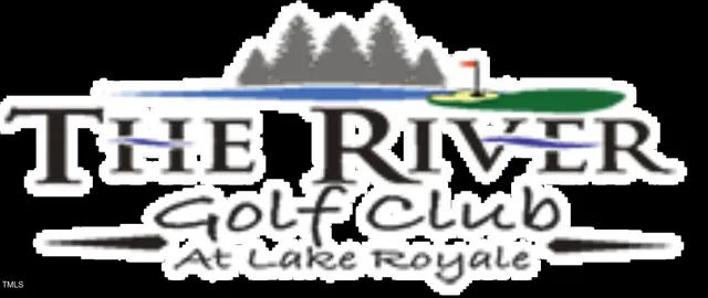 a front view of a house with garden and patio