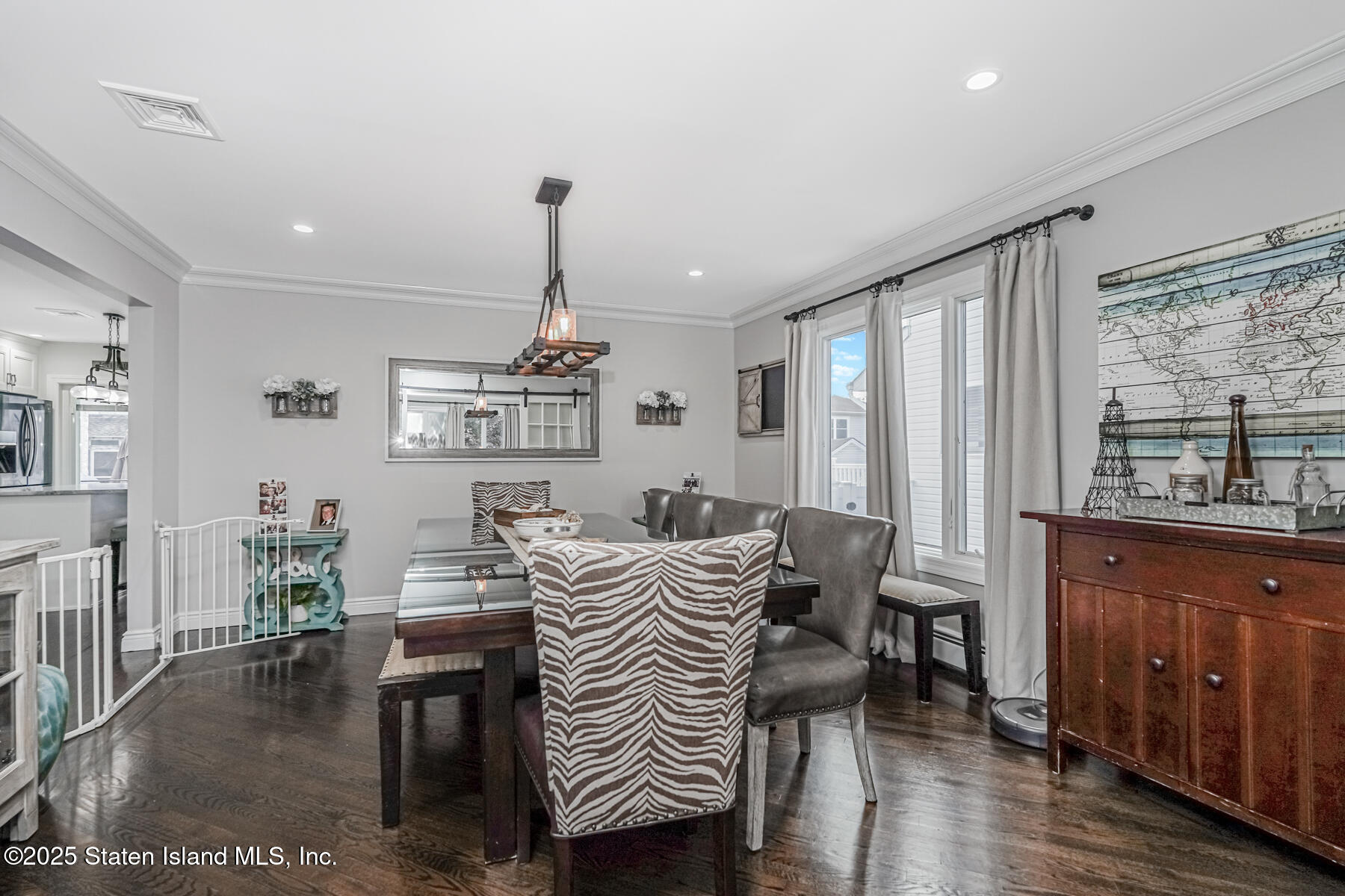 26 Rochelle Place Staten Island, NY 10312 - Photo 11 of 47 a view of a livingroom with furniture window and wooden floor