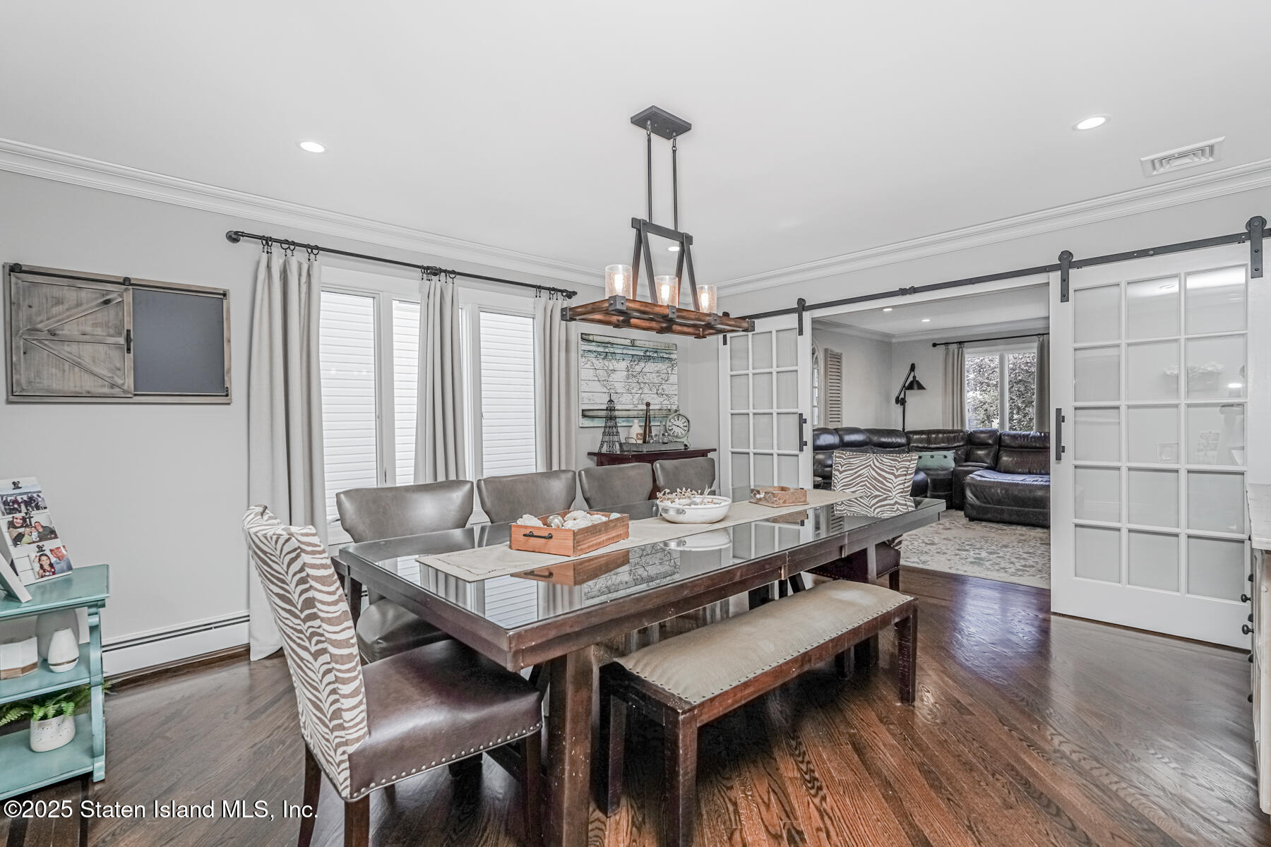 26 Rochelle Place Staten Island, NY 10312 - Photo 12 of 47 a view of a dining room with furniture window and wooden floor