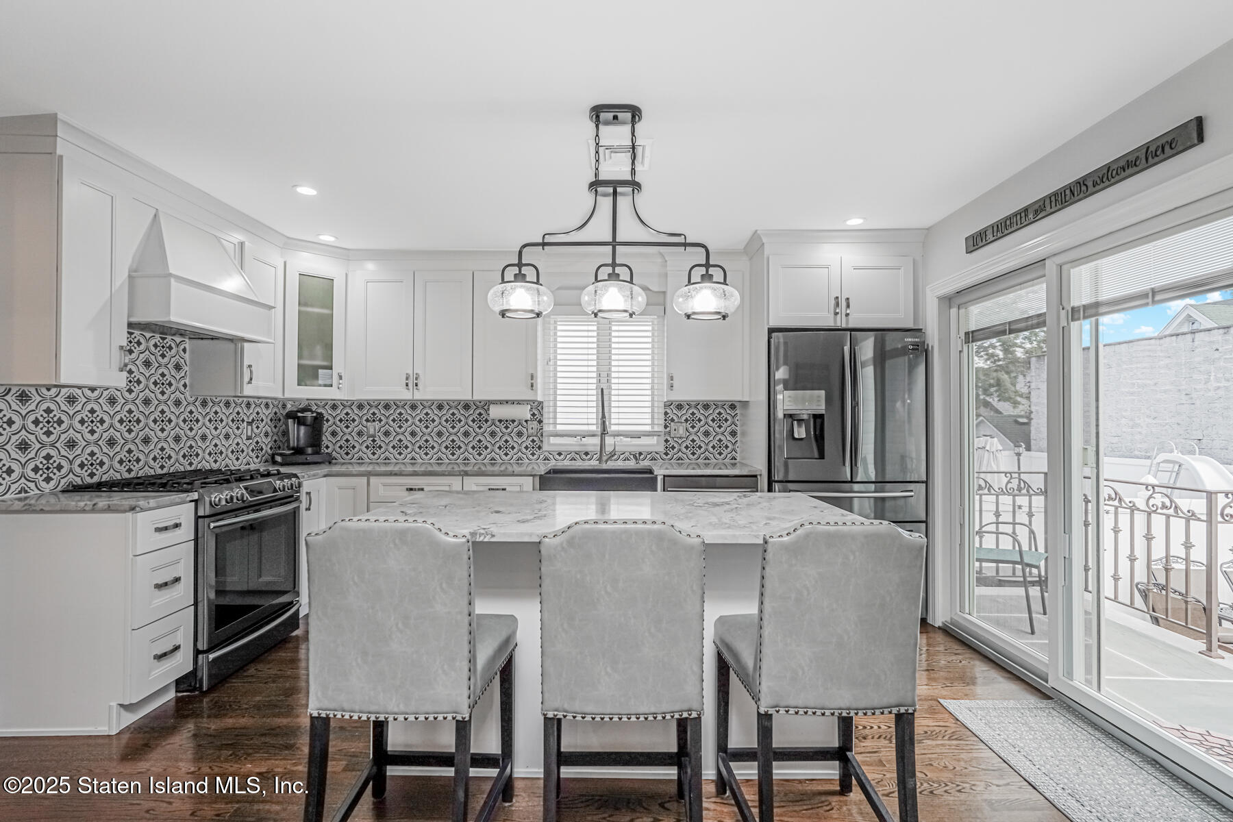 26 Rochelle Place Staten Island, NY 10312 - Photo 15 of 47 a view of kitchen with granite countertop cabinets table and chairs