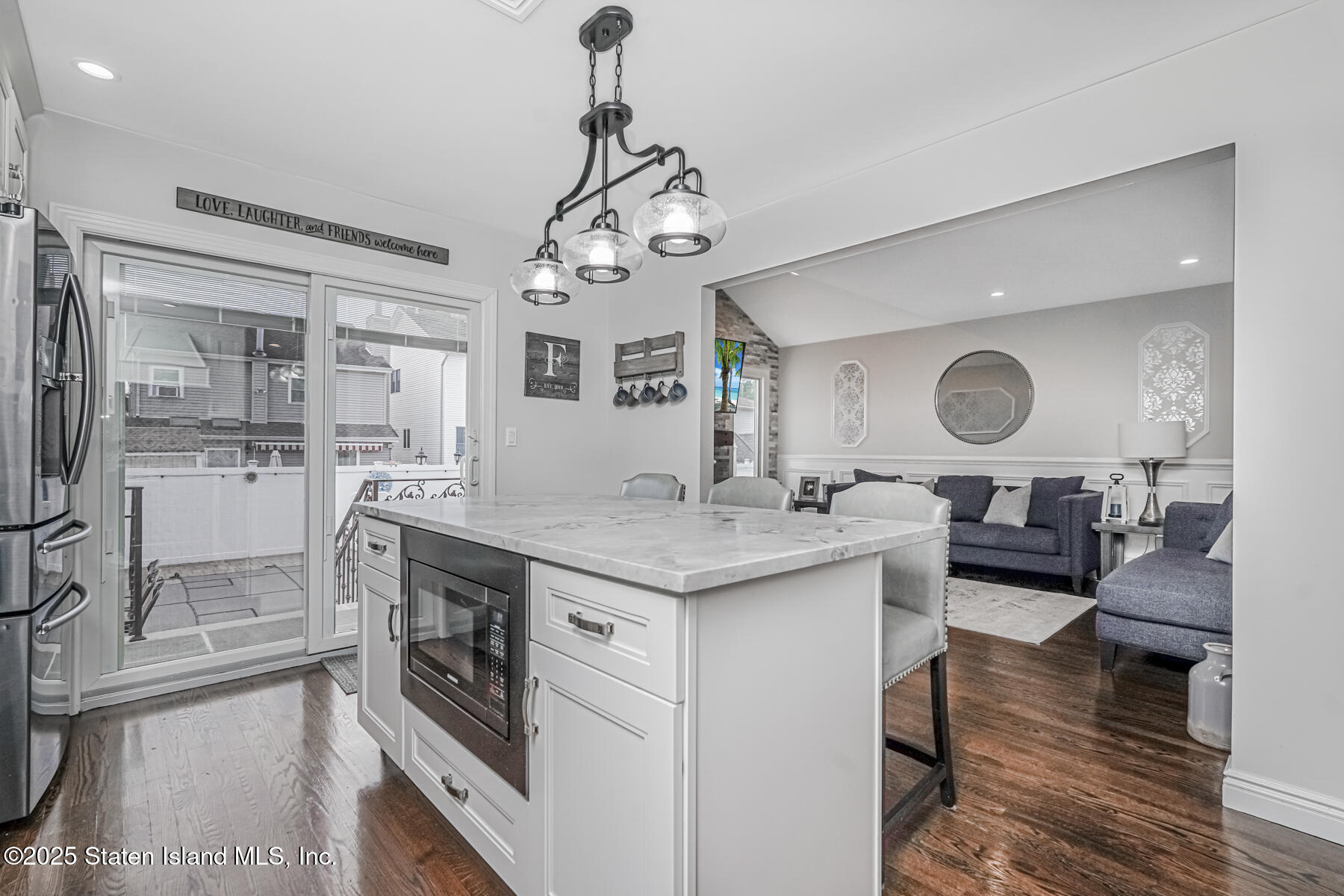 26 Rochelle Place Staten Island, NY 10312 - Photo 18 of 47 a kitchen with stainless steel appliances granite countertop a sink and a stove