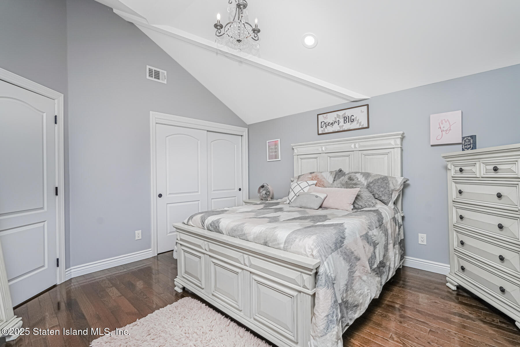 26 Rochelle Place Staten Island, NY 10312 - Photo 26 of 47 a bedroom with a bed and ceiling fan