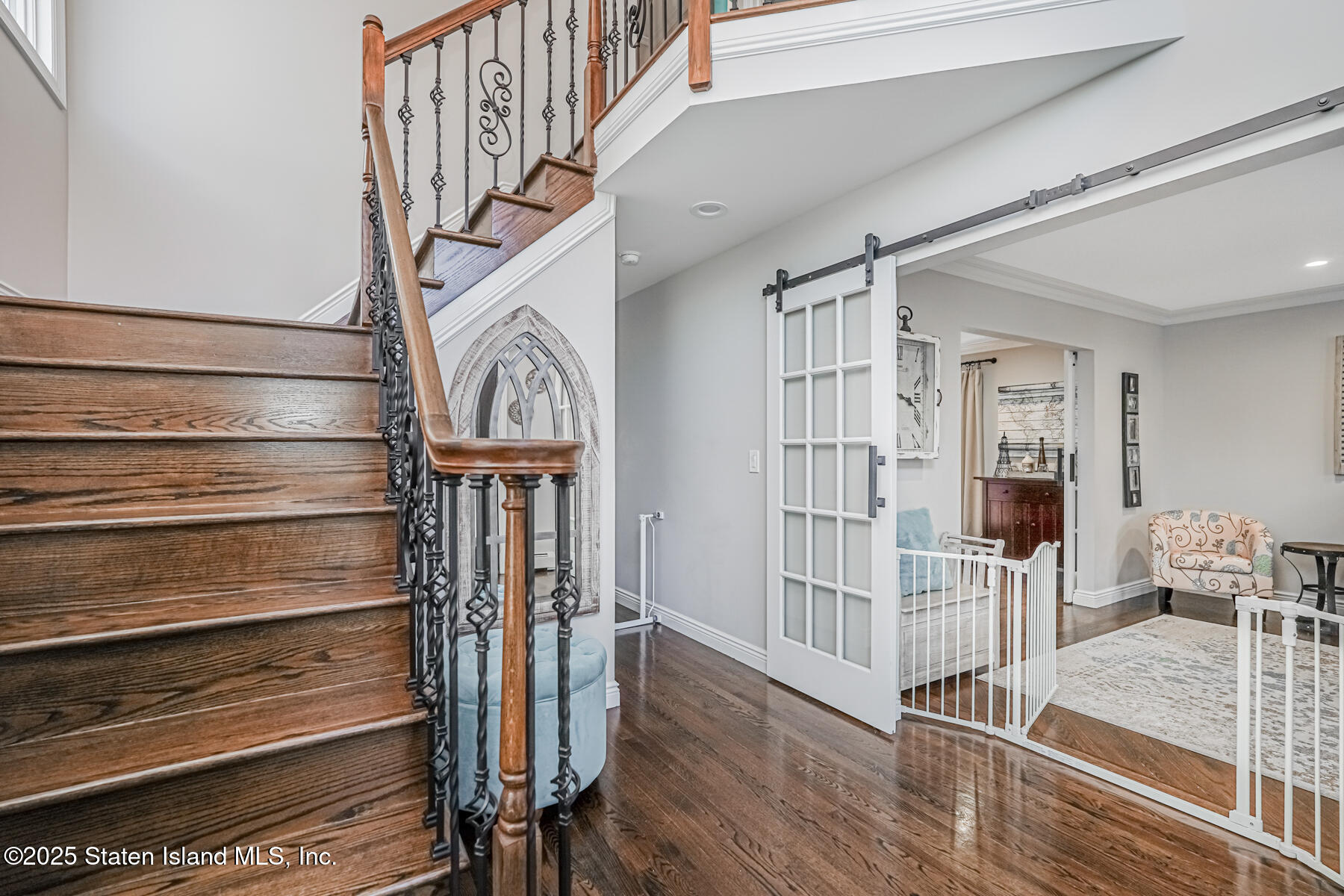 26 Rochelle Place Staten Island, NY 10312 - Photo 3 of 47 a view of a hallway with wooden floor and entryway