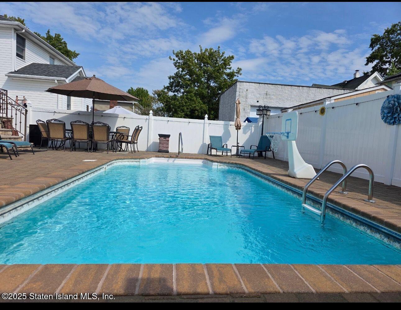 26 Rochelle Place Staten Island, NY 10312 - Photo 45 of 47 swimming pool view with a outdoor space