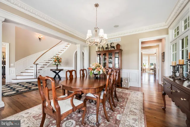 a view of walk in closet with clothes