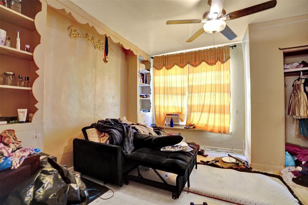 57 Northwest 68th Street Miami, FL 33150 - Photo 14 of 36 a living room with furniture and a window