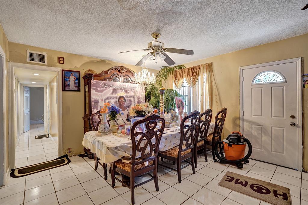 57 Northwest 68th Street Miami, FL 33150 - Photo 17 of 36 a view of a dining room with furniture