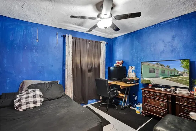 a room with furniture and flat screen tv