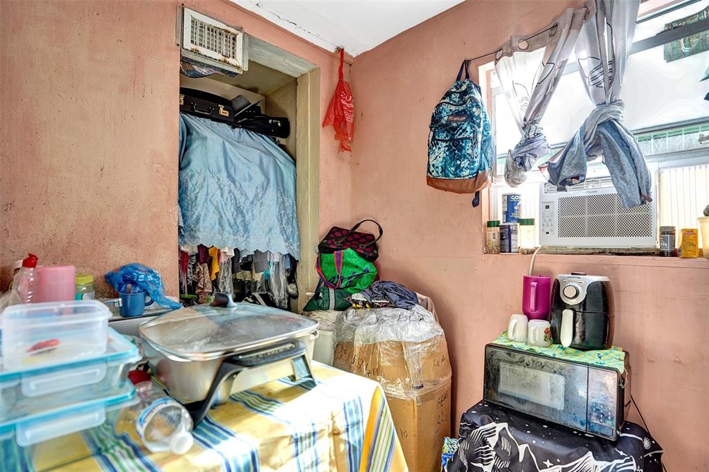 57 Northwest 68th Street Miami, FL 33150 - Photo 27 of 36 a living room with furniture and a mirror