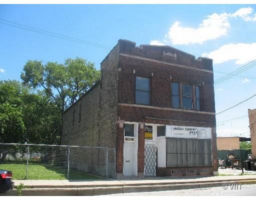 2139 South Pulaski Road Chicago, IL 60623 - Photo 1 of 1 a front view of a house with a garden