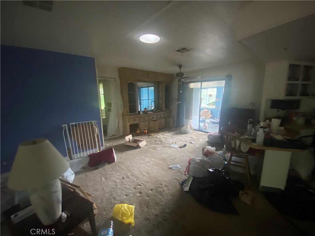 11862 Old Spruce Grove Road Lower Lake, CA 95457 - Photo 6 of 23 Living area looking toward dining area and sliding door to sun porch.