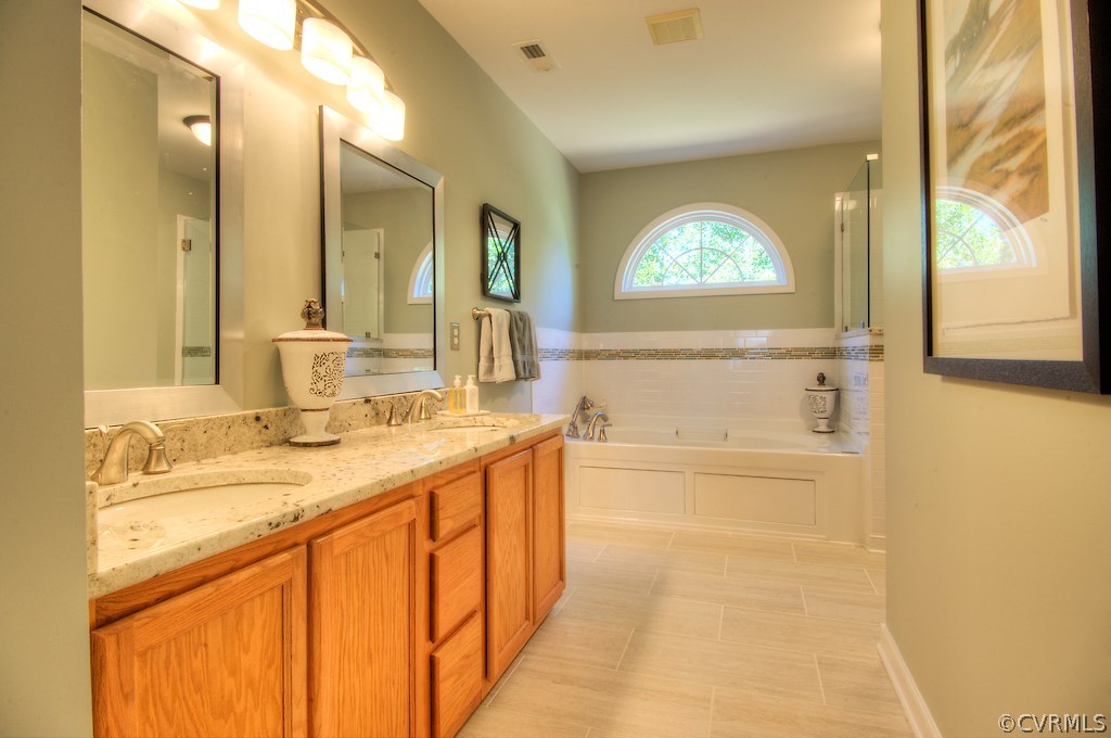 13506 Brandy Oaks Road Chesterfield, VA 23832 - Photo 16 of 24 Private master bath with double vanity, granite co