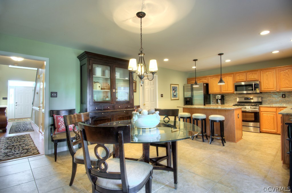 Eat-in kitchen with so much to offer - tile floors