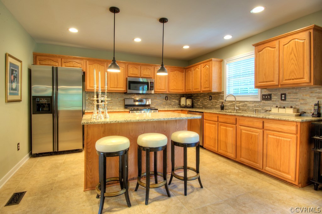 Eat-in kitchen with so much to offer - tile floors