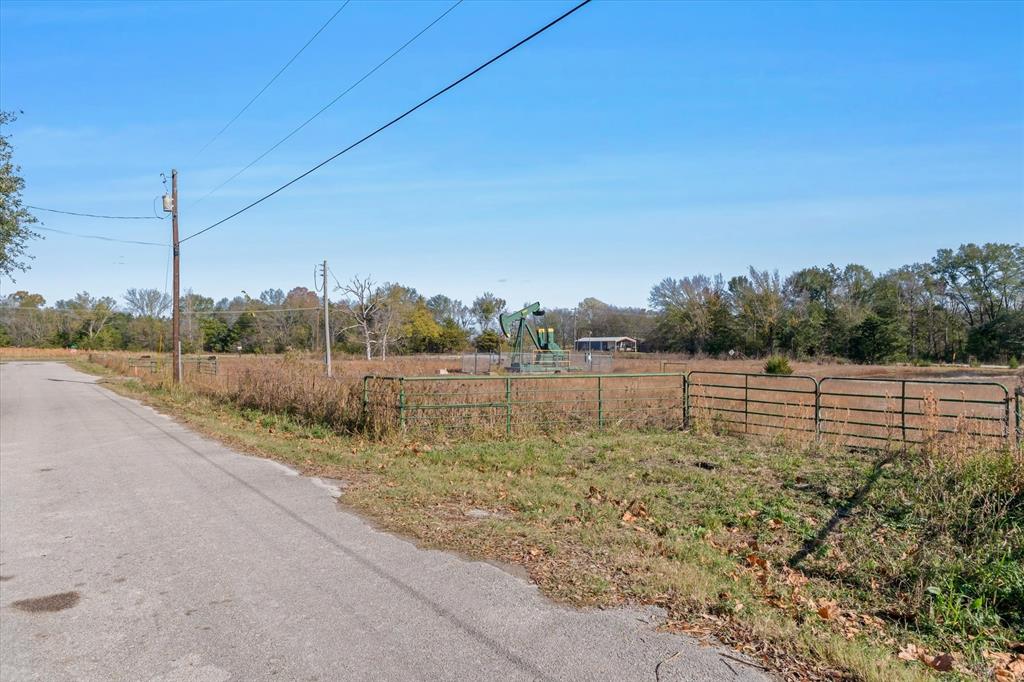 0 West Ohio Street Van, TX 75790 - Photo 17 of 21 a view of a lake view with a large trees