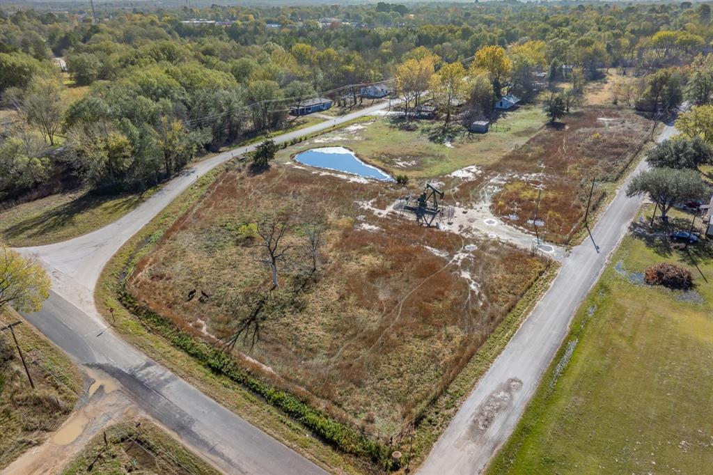 0 West Ohio Street Van, TX 75790 - Photo 9 of 21 a view of a swimming pool with a yard