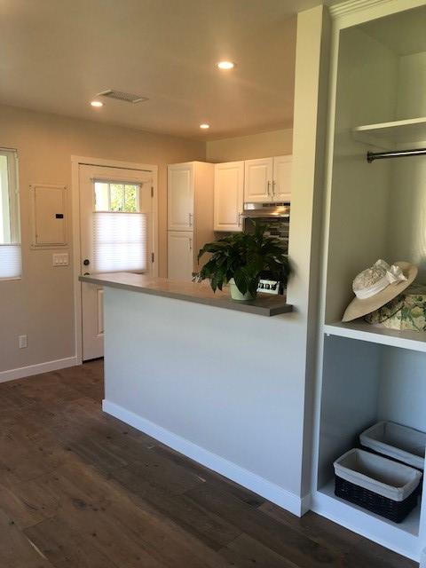 2077 Rebild Drive Solvang, CA 93463 - Photo 5 of 12 a kitchen with wooden floor and a window