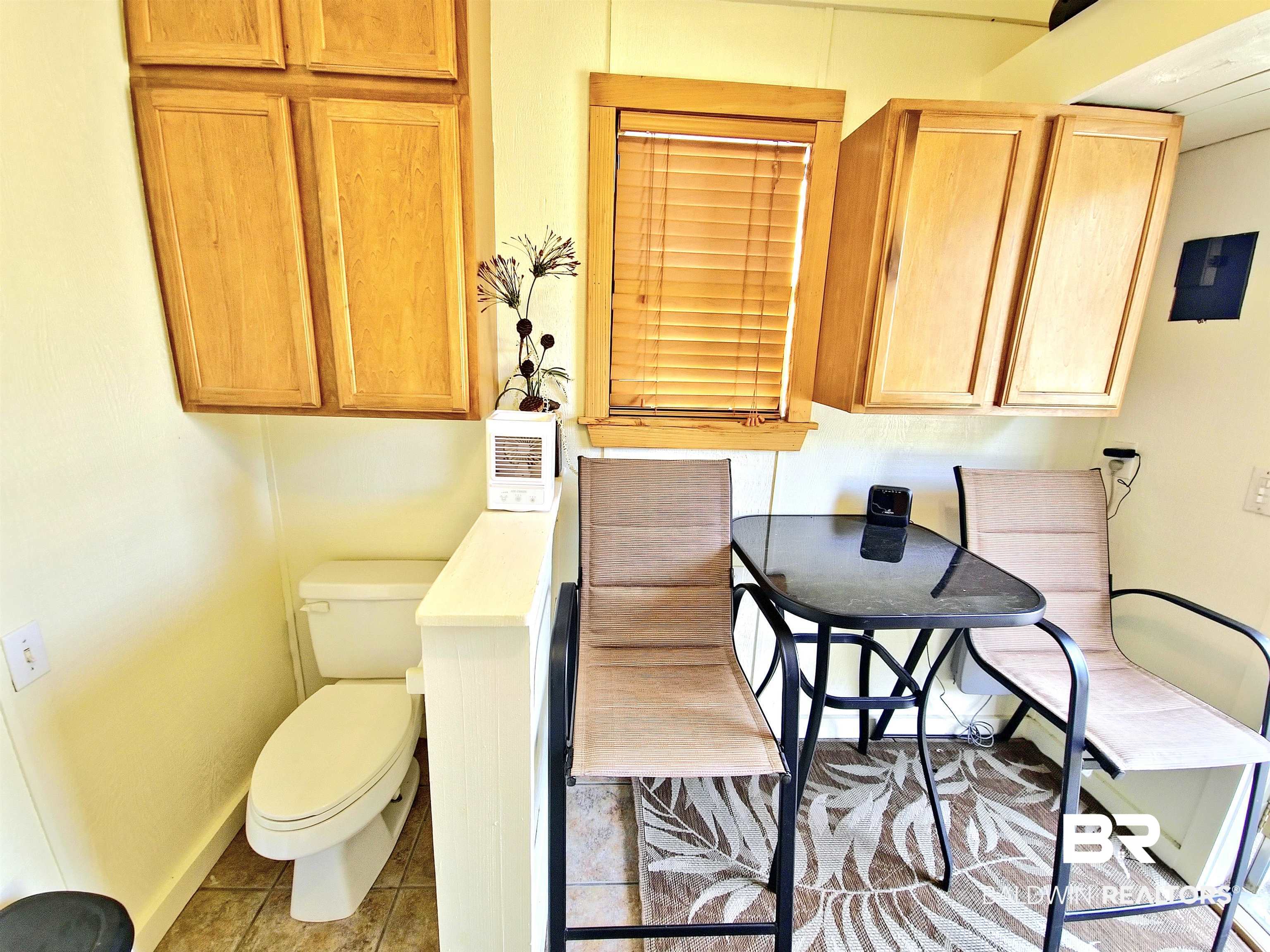 4650 Griffith Marina Road, Unit 12 Orange Beach, AL 36561 - Photo 11 of 34 Bathroom with baseboards and light tile patterned floors