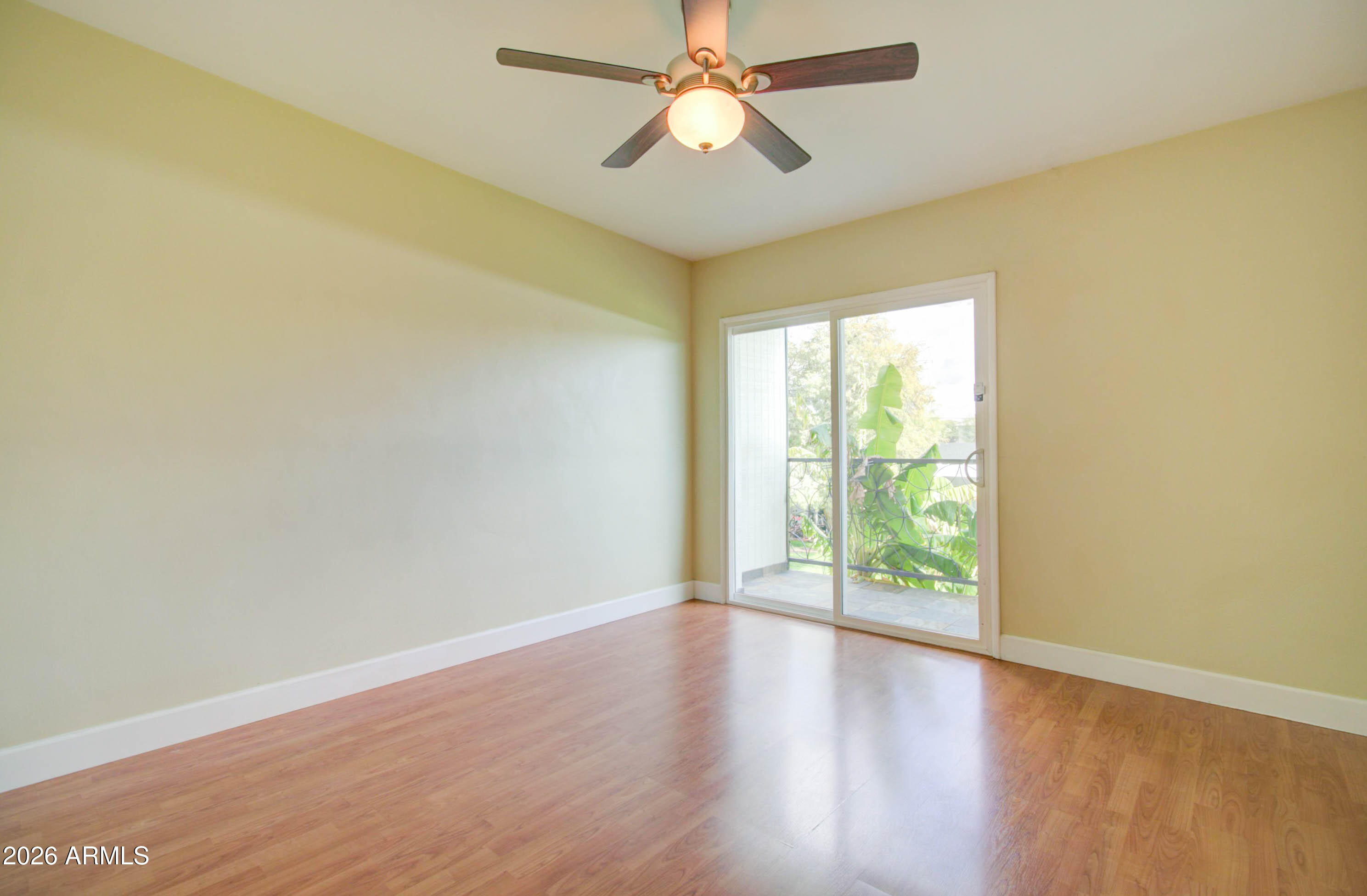 3242 East Camelback Road, Unit 207 Phoenix, AZ 85018 - Photo 14 of 25 Master Bedroom w/ Private Balcony