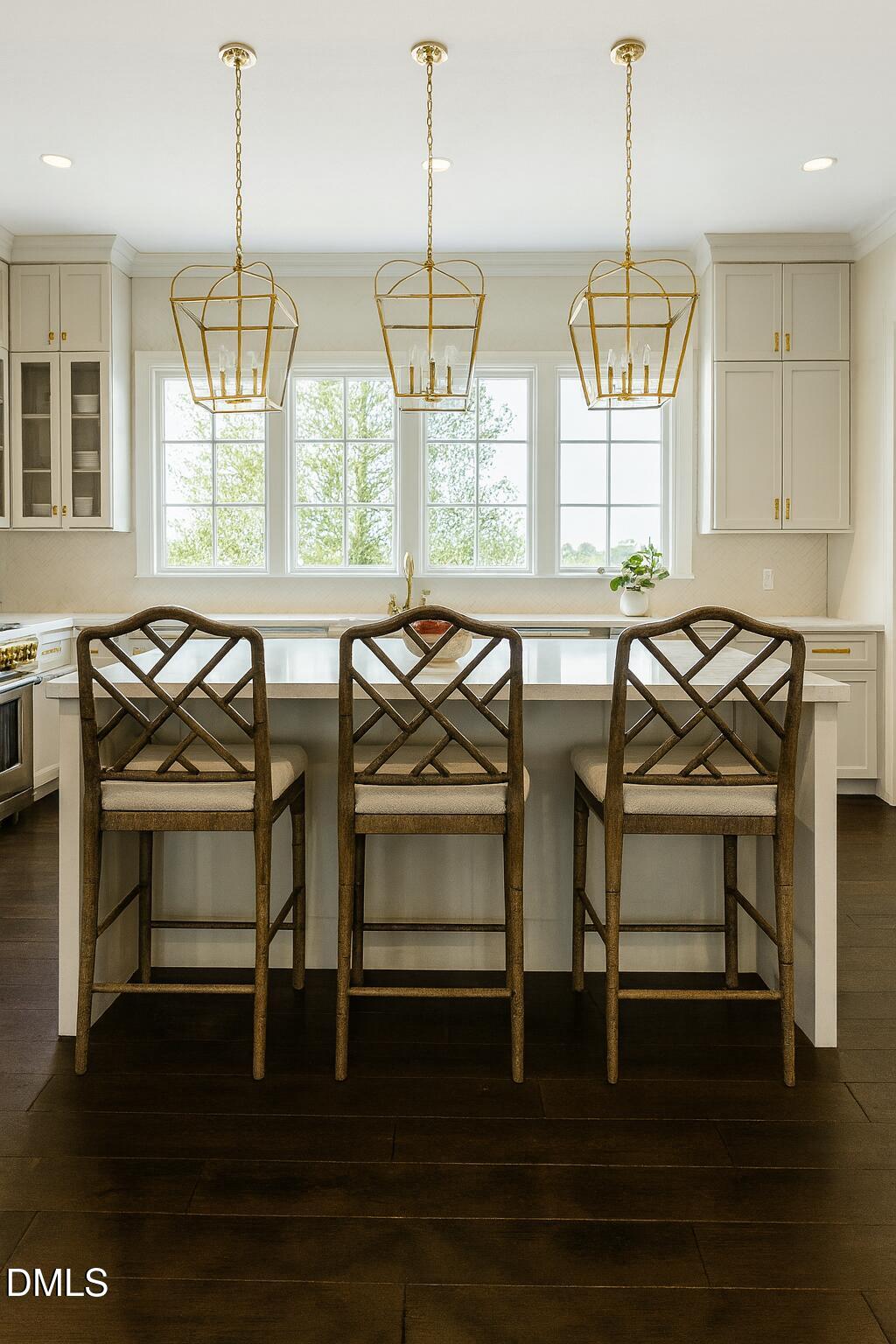 2301 Grant Avenue Raleigh, NC 27608 - Photo 8 of 16 a view of a dining room with furniture window and wooden floor