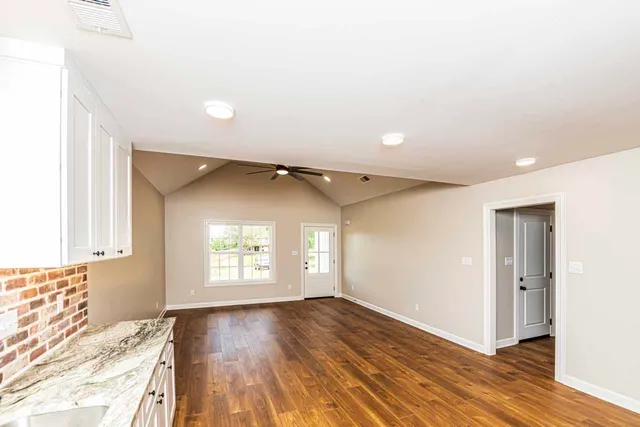 a view of an empty room and window