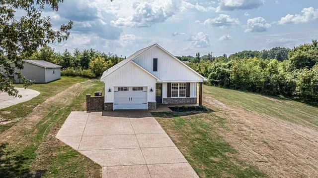 a house view with a backyard space
