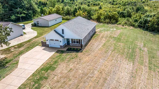 a house view with a garden space