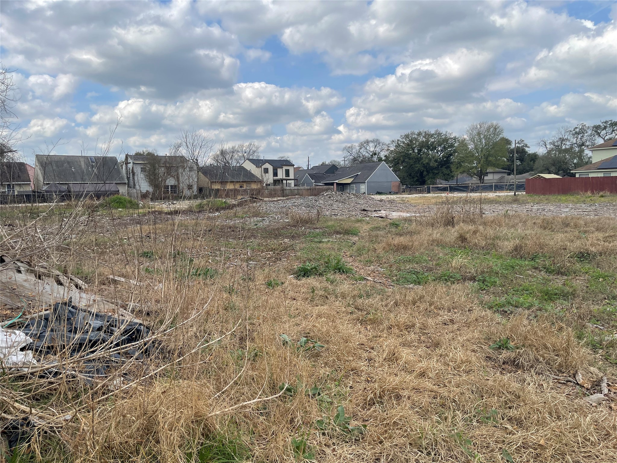 0 John Alber Road Houston, TX 77076 - Photo 23 of 31 a view of a dry yard with wooden fence