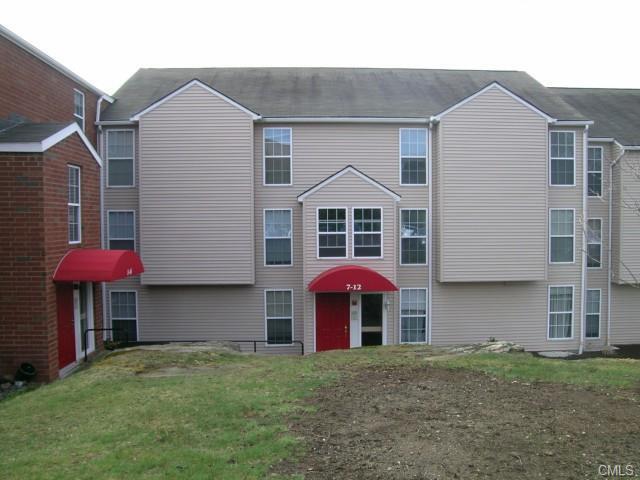 8 Heather Ridge, Unit 8 Shelton, CT 06484 - Photo 1 of 1 a front view of a house with an outdoor space