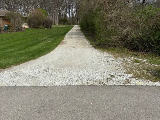 a view of patio with a yard