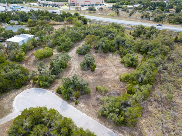 an aerial view of residential house with outdoor space