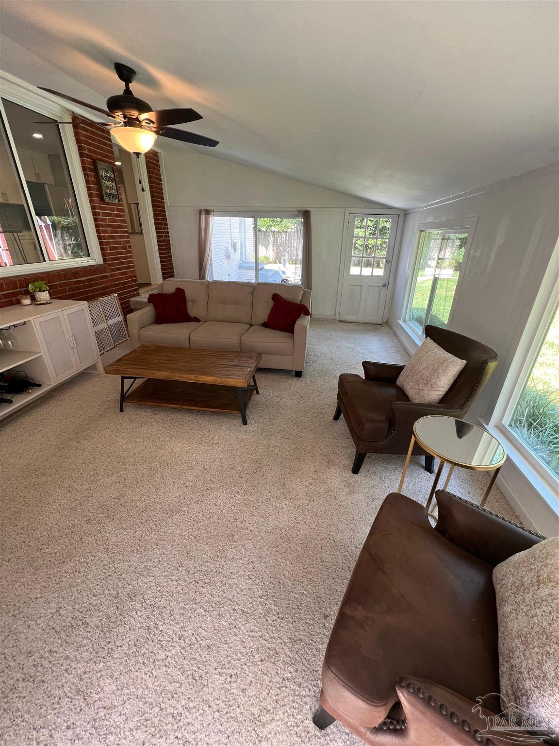 320 Gamarra Road Pensacola, FL 32503 - Photo 22 of 29 a living room with furniture and a window