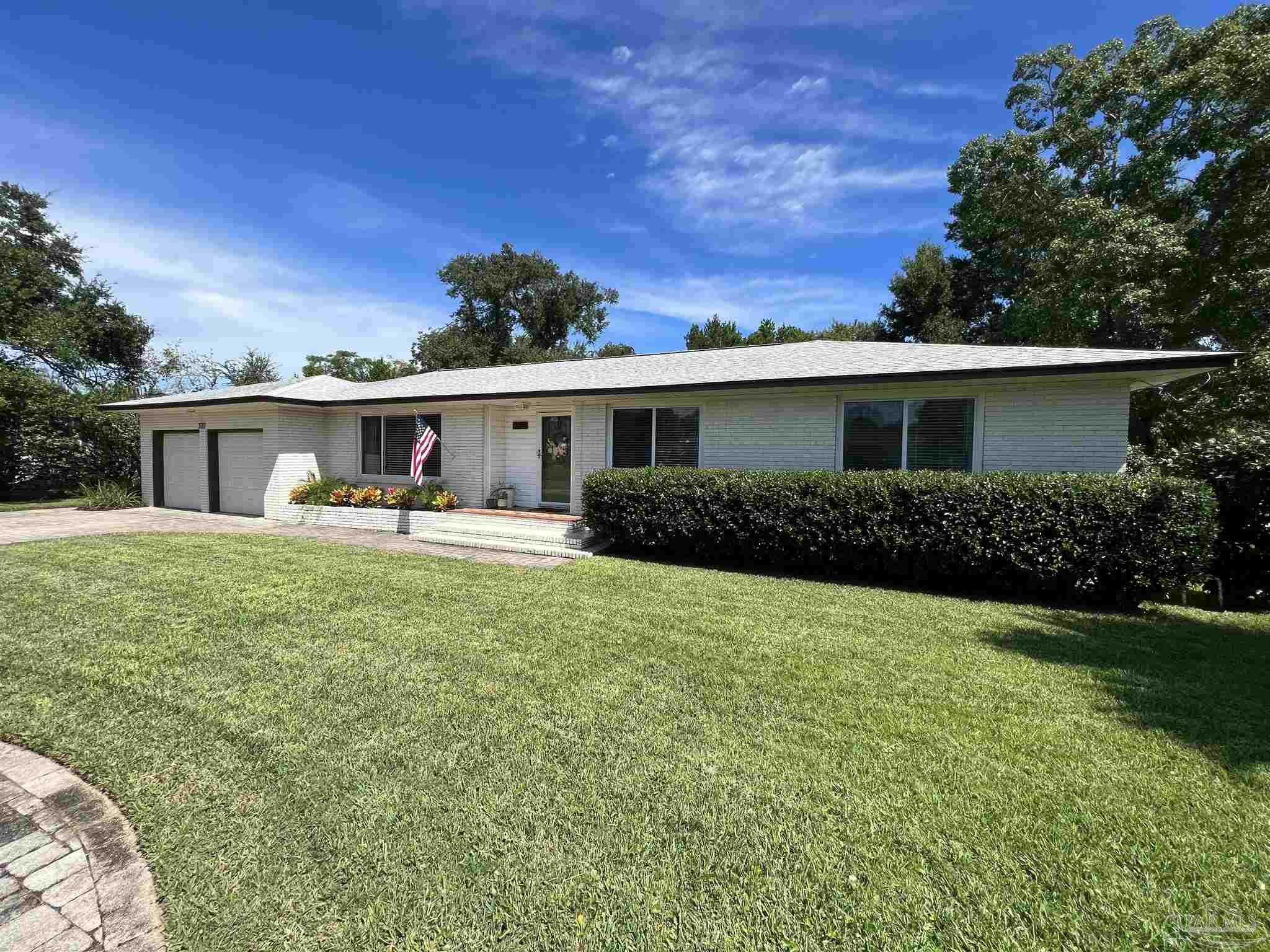 320 Gamarra Road Pensacola, FL 32503 - Photo 24 of 29 a front view of a house with a yard