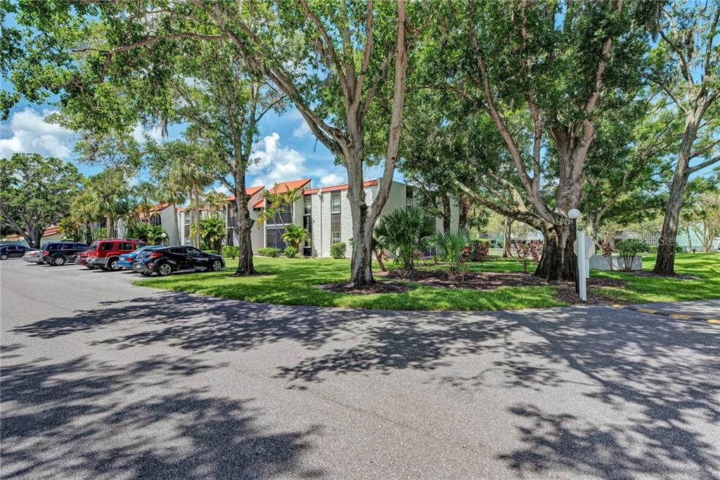 3249 South Beneva Road, Unit 101 Sarasota, FL 34232 - Photo 1 of 1 a view of a park with tree s