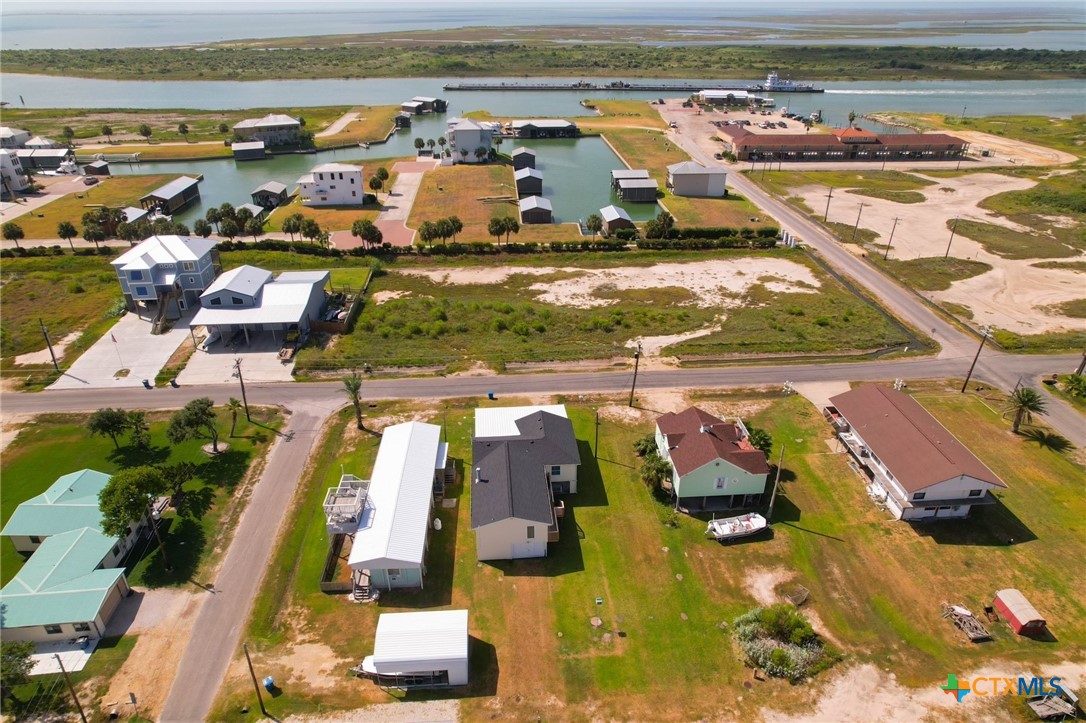 604 Maple Street Port O'Connor, TX 77982 - Photo 2 of 46 an aerial view of residential houses with outdoor space
