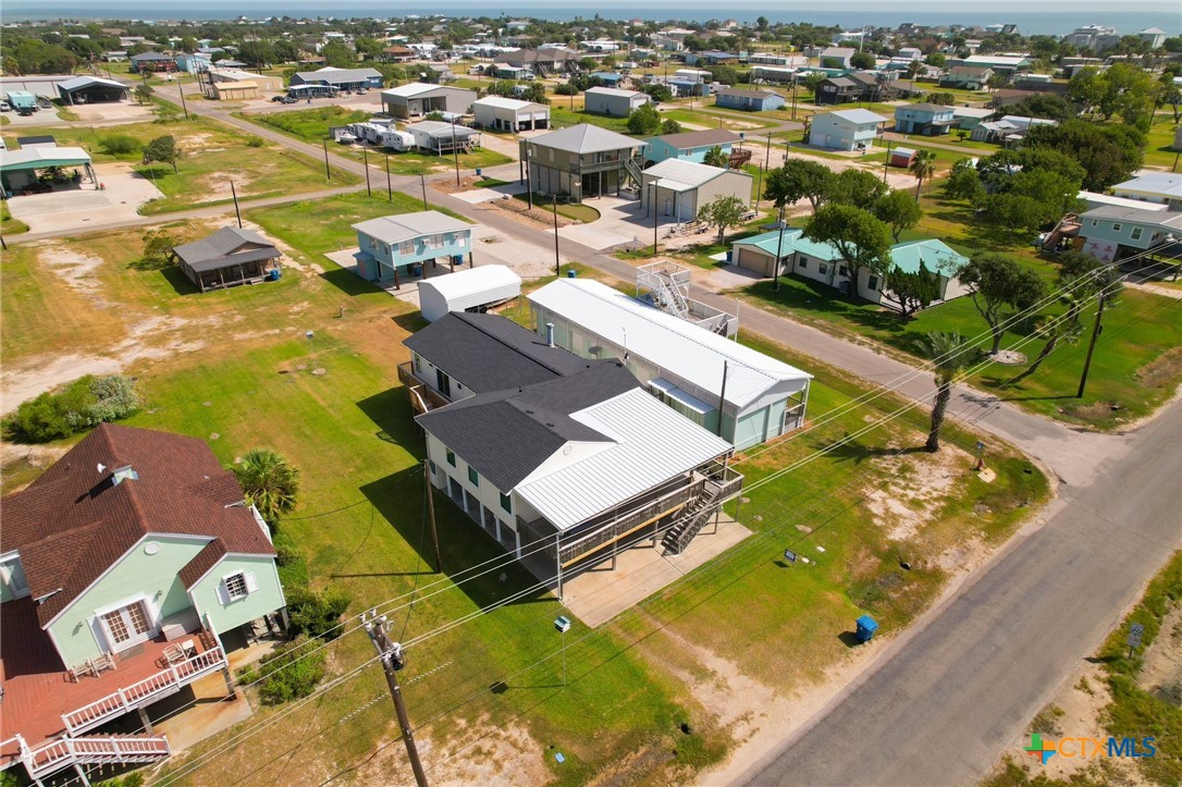 604 Maple Street Port O'Connor, TX 77982 - Photo 22 of 46 an aerial view of residential houses with outdoor space