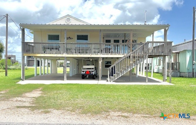 604 Maple Street Port O'Connor, TX 77982 - Photo 4 of 46 a view of house with a swimming pool and a yard