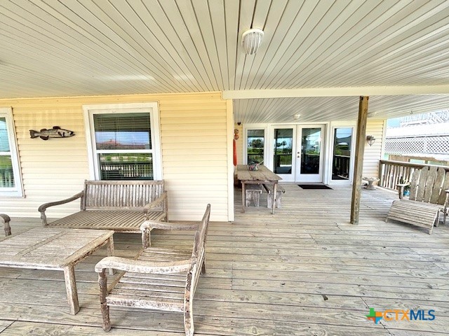 604 Maple Street Port O'Connor, TX 77982 - Photo 41 of 46 a view of a swimming pool with outdoor seating