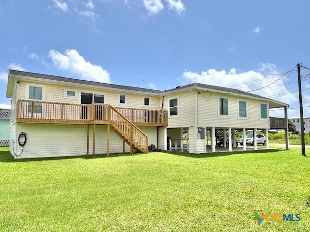 604 Maple Street Port O'Connor, TX 77982 - Photo 44 of 46 a view of a house with a big yard and sitting area