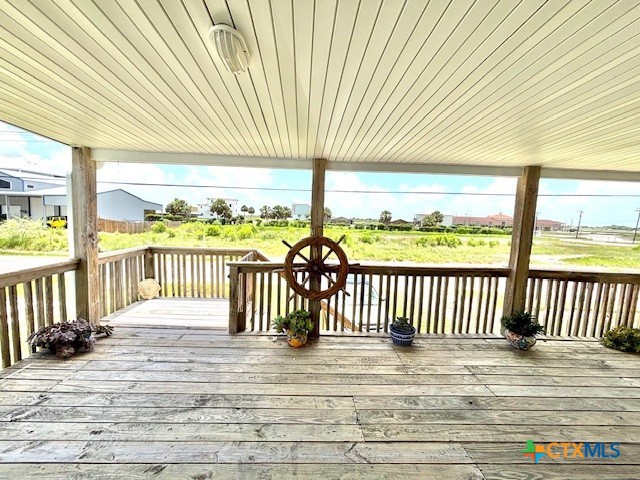 604 Maple Street Port O'Connor, TX 77982 - Photo 7 of 46 a view of a room with wooden floor