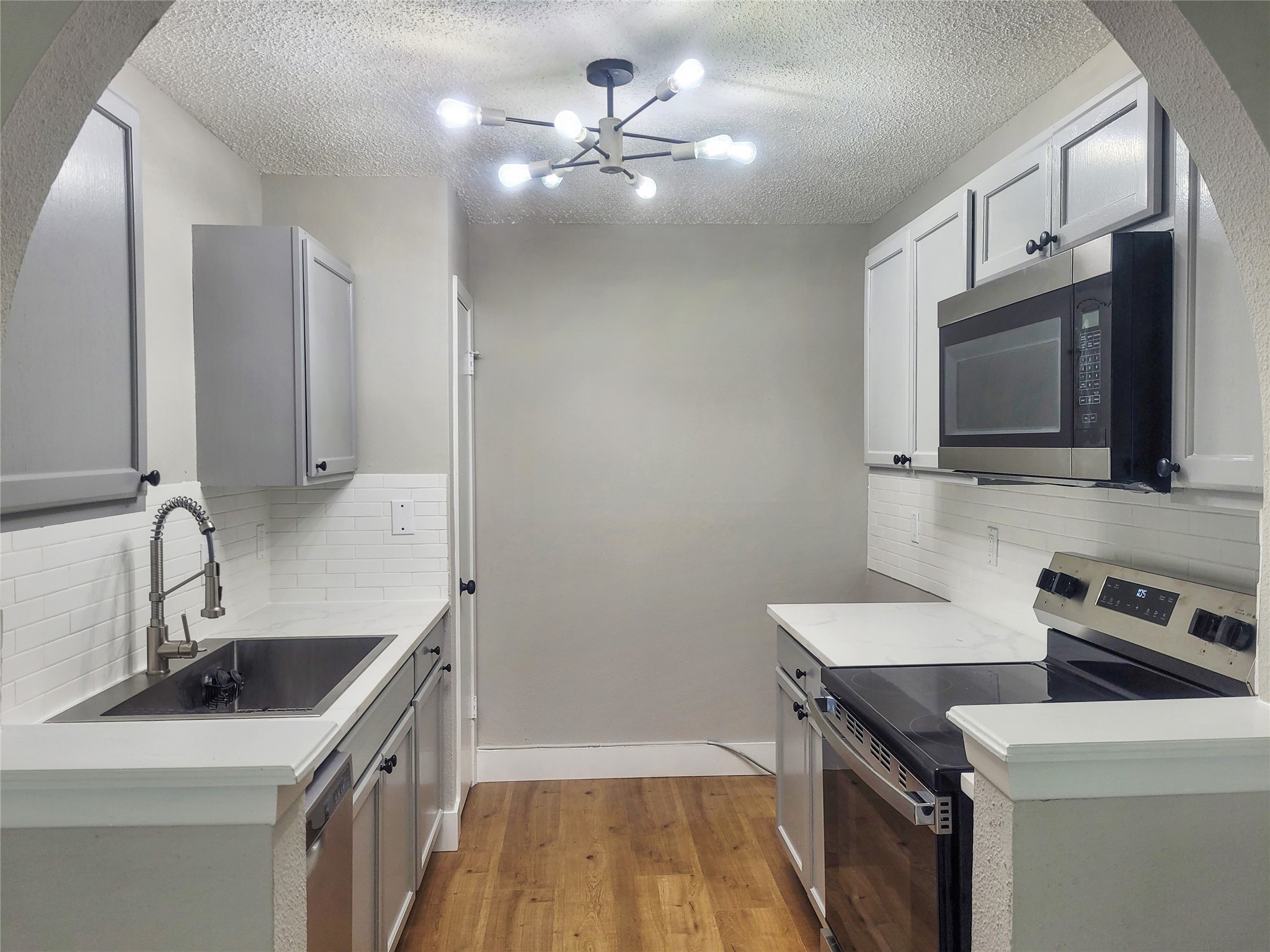 3118 Raccoon Run Spring, TX 77373 - Photo 5 of 19 Kitchen with stainless steel appliances