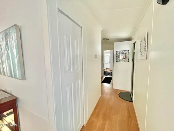 a bedroom with a bed and a table