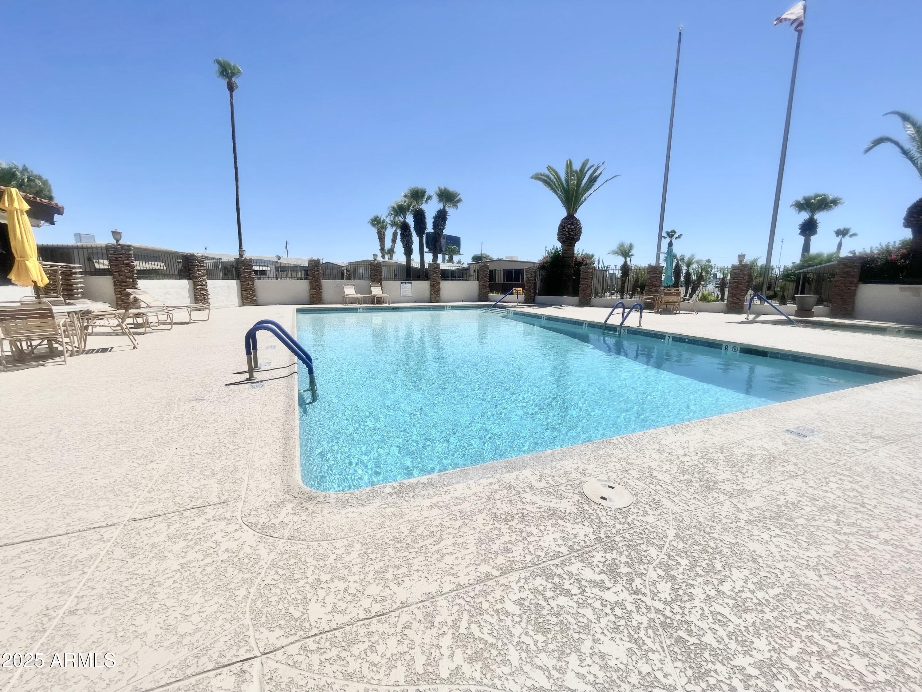 10220 East Apache Trail, Unit 210 Apache Junction, AZ 85120 - Photo 33 of 43 PACIFICMANORCLUBPOOLCLOSE