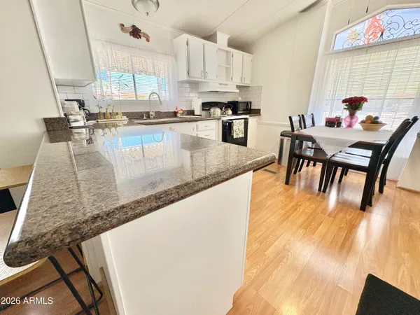 a view of a dining room with furniture