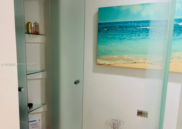 a view of kitchen from a hallway