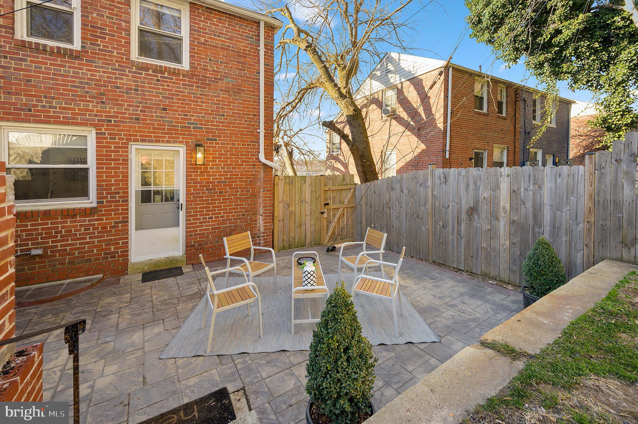 3631 South Kemper Road Arlington, VA 22206 - Photo 16 of 30 Large stamped concrete patio off fully-fenced yard